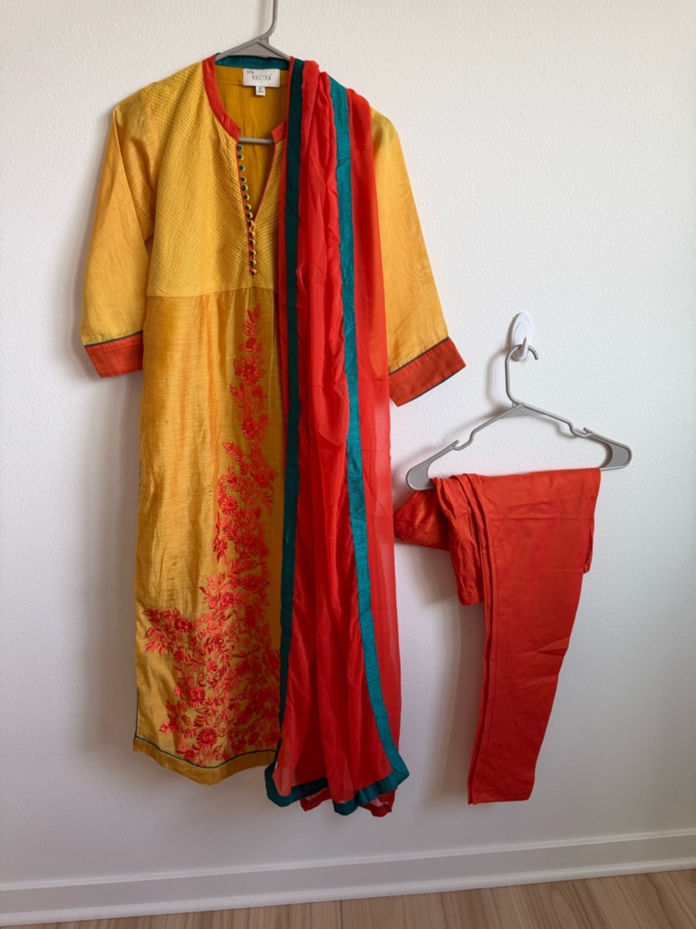 Astr Yellow Kurta with Red and Teal Accents